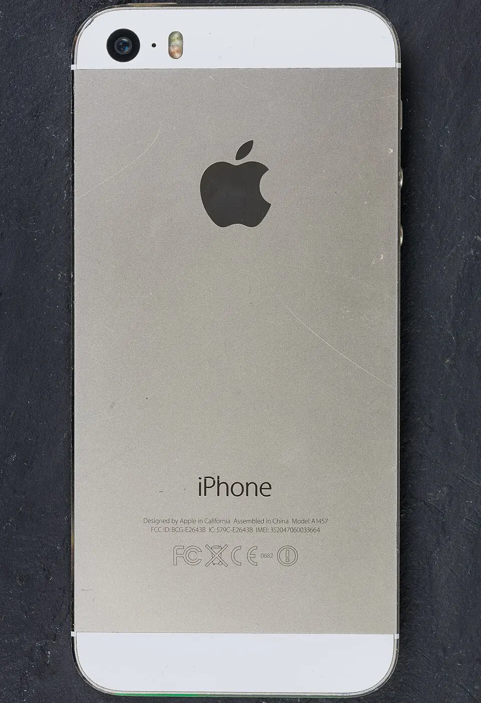 Rear of an iPhone 5s in gold (model A1457)
