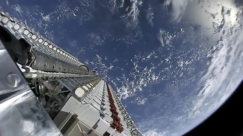 The first 60 Starlink satellites, stacked in orbit before deployment, May 2019