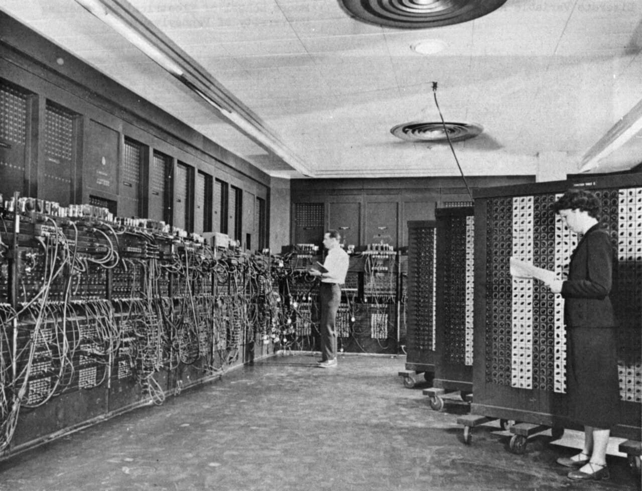 ENIAC in building 328 at the Ballistic Research Laboratory, with Glen Beck and Betty Snyder at the machine