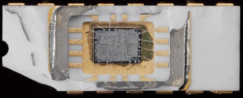 An Intel 4004 (1971) with its package opened, showing the die and bond wires