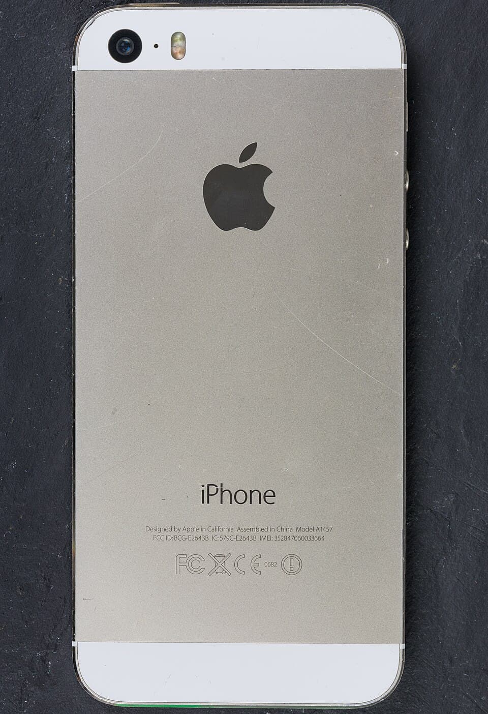Rear of an iPhone 5s in gold (model A1457)